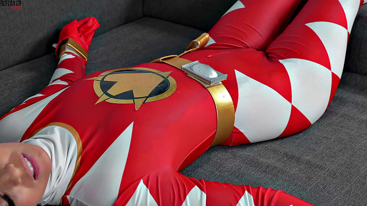 Hot brunette dominates over a Superhero girl