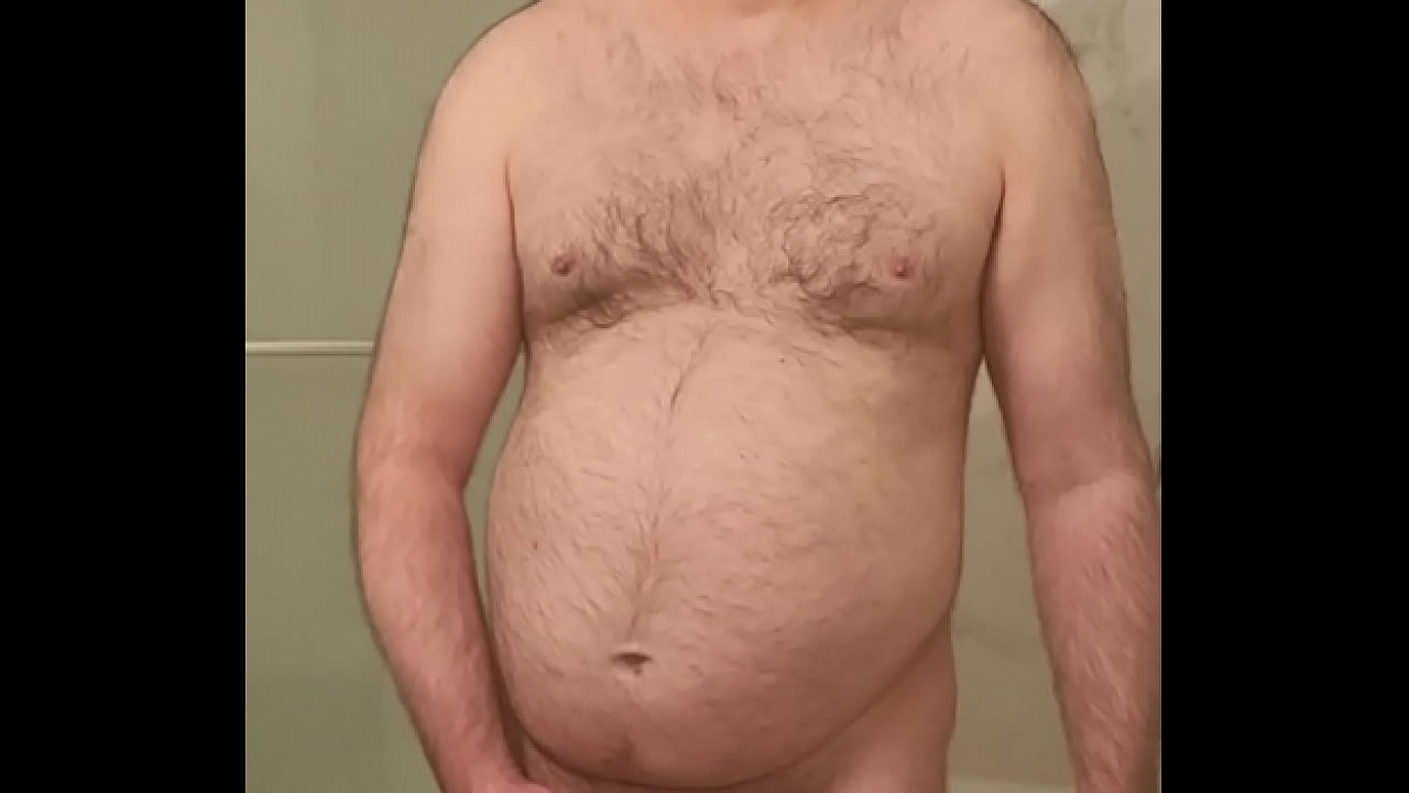 Naked Martin Lavallee wanks, cums and eats his jizz