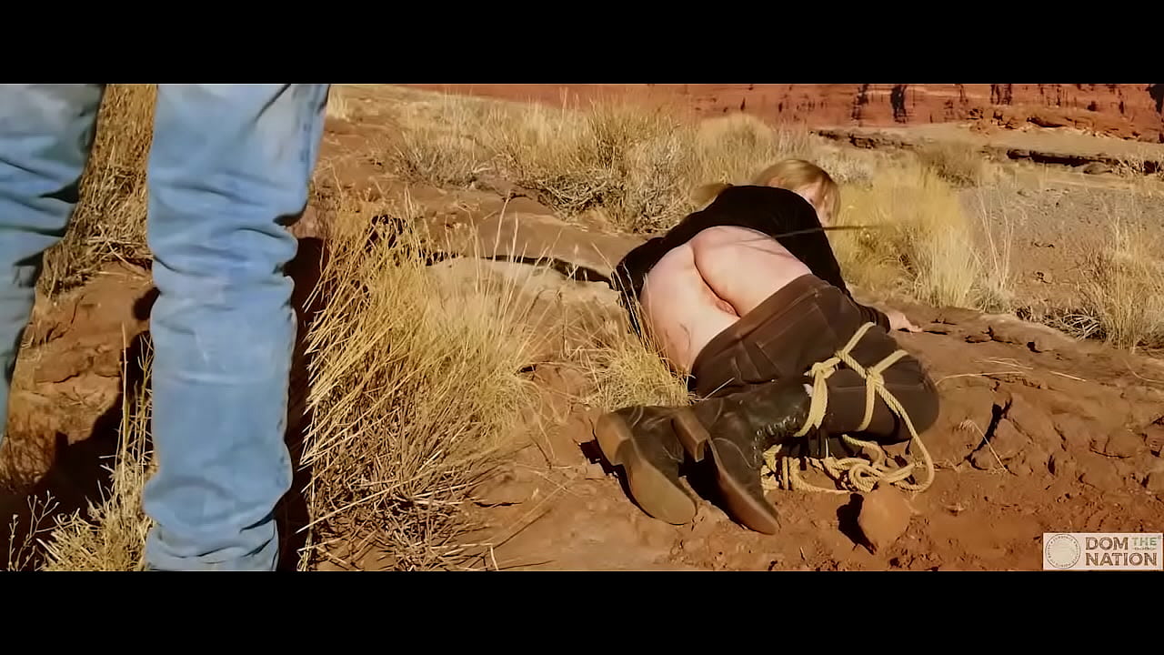 Submissive babe gets an asshole whipping before getting butt fucked on pee-covered ground -- a hard, genuine domination adventure out in nature (Rebel Rhyder)