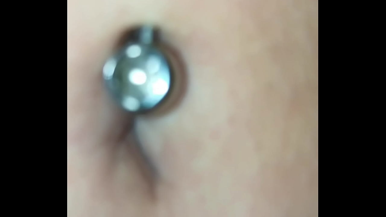 Exploring this sexy belly button with its piercing up close