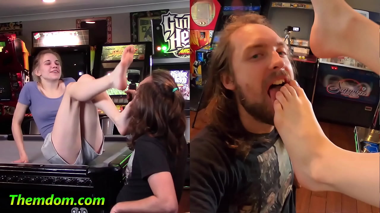 Arcade foot slave licks Rose Carter's feet