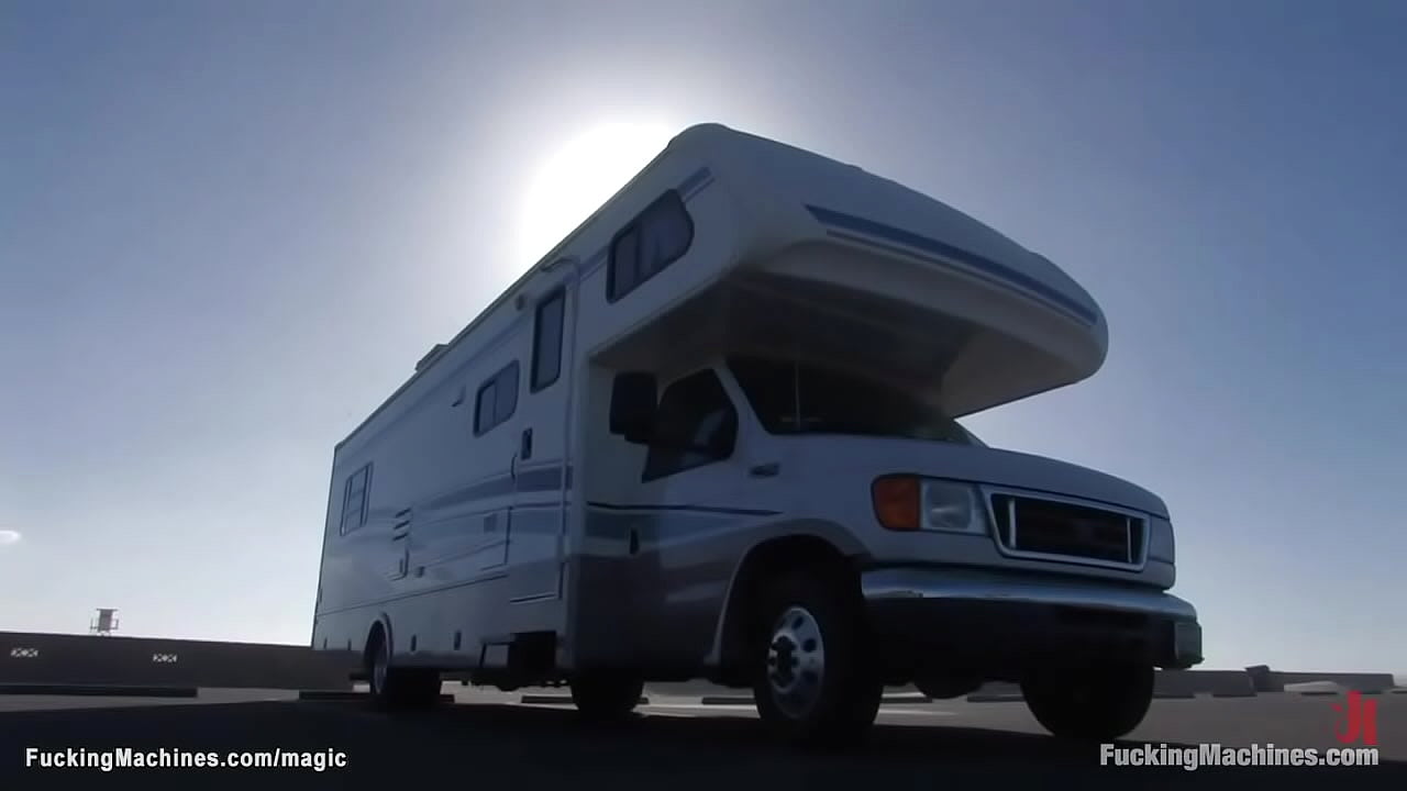 Natural busty blonde babe Kissy Kapri gets horny on the beach and she moves in her camper where fucks double penetration machine and vibrator solo