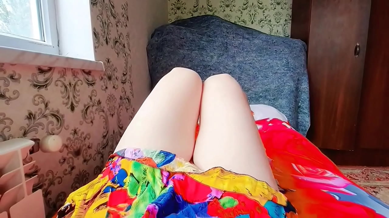 Cute femboy pulling oversized sweater over bare legs