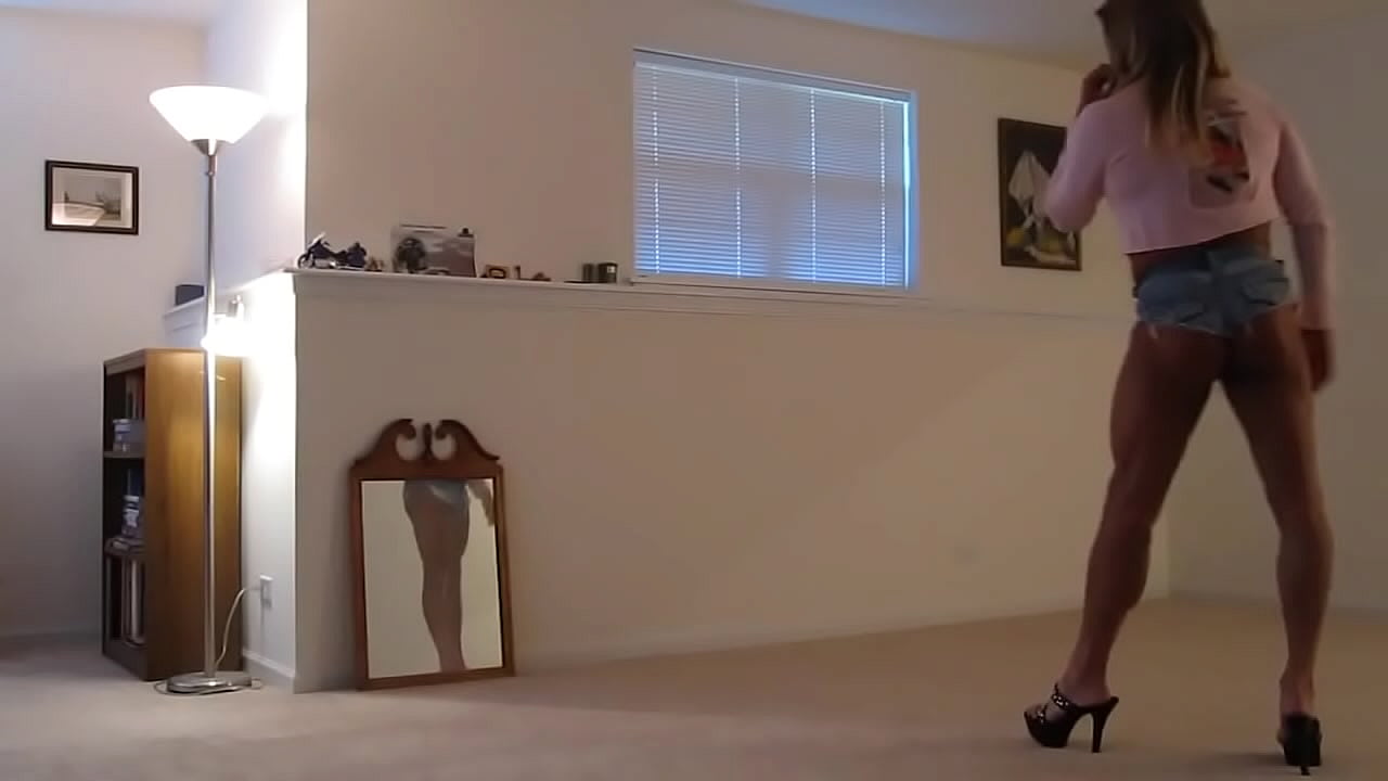 Tanned Blonde Crossdresser in Cheeky Short Shorts