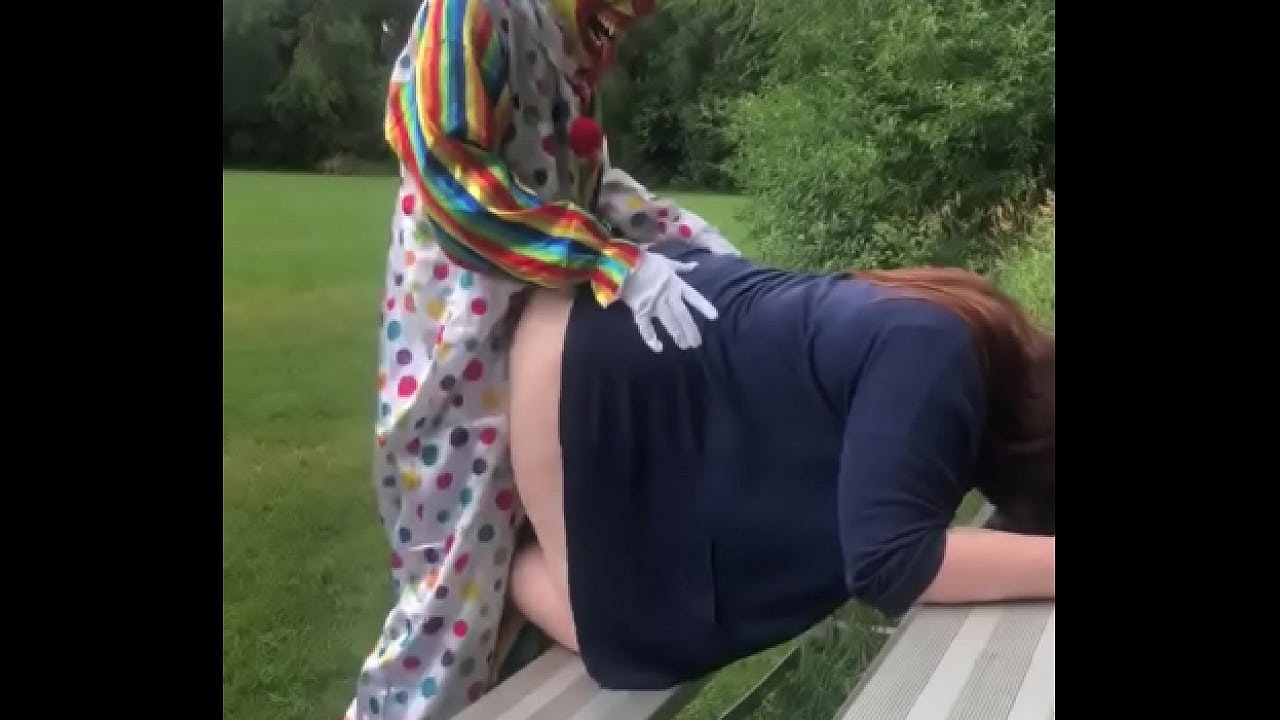 Clown fucks girl in soccer field