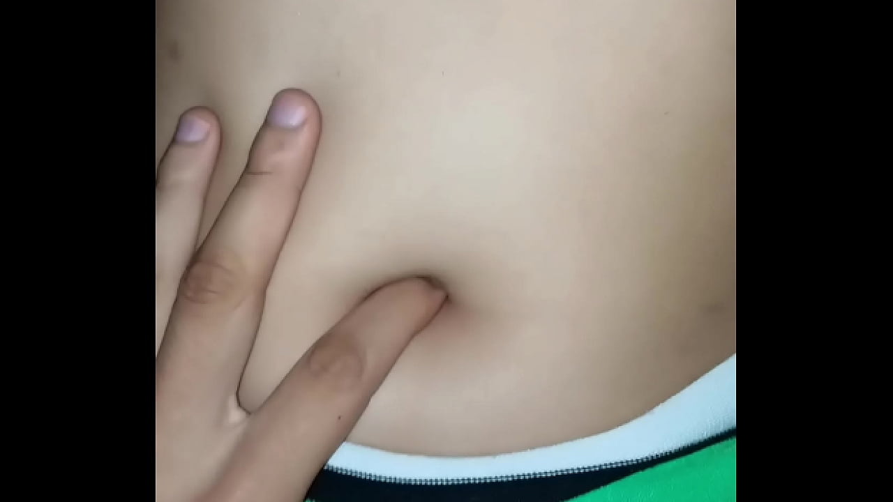 I peck her belly button while she rides me