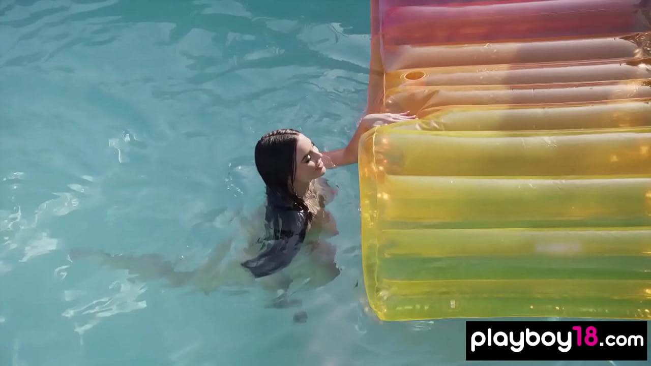 Busty American beauty reveals her pierced nipples outdoor