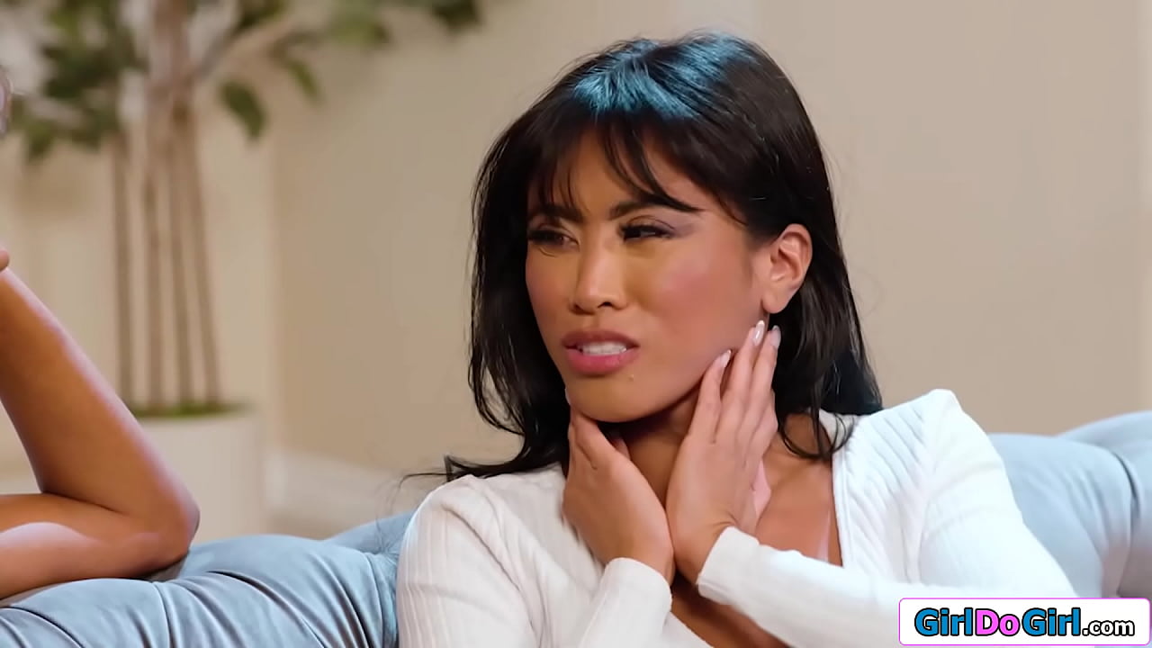 Ebony Kylie LeBeau gives her busty asian gf Ember Snow a facial massage which leads to a boobs massage.The lesbian are turned on and lick pussy