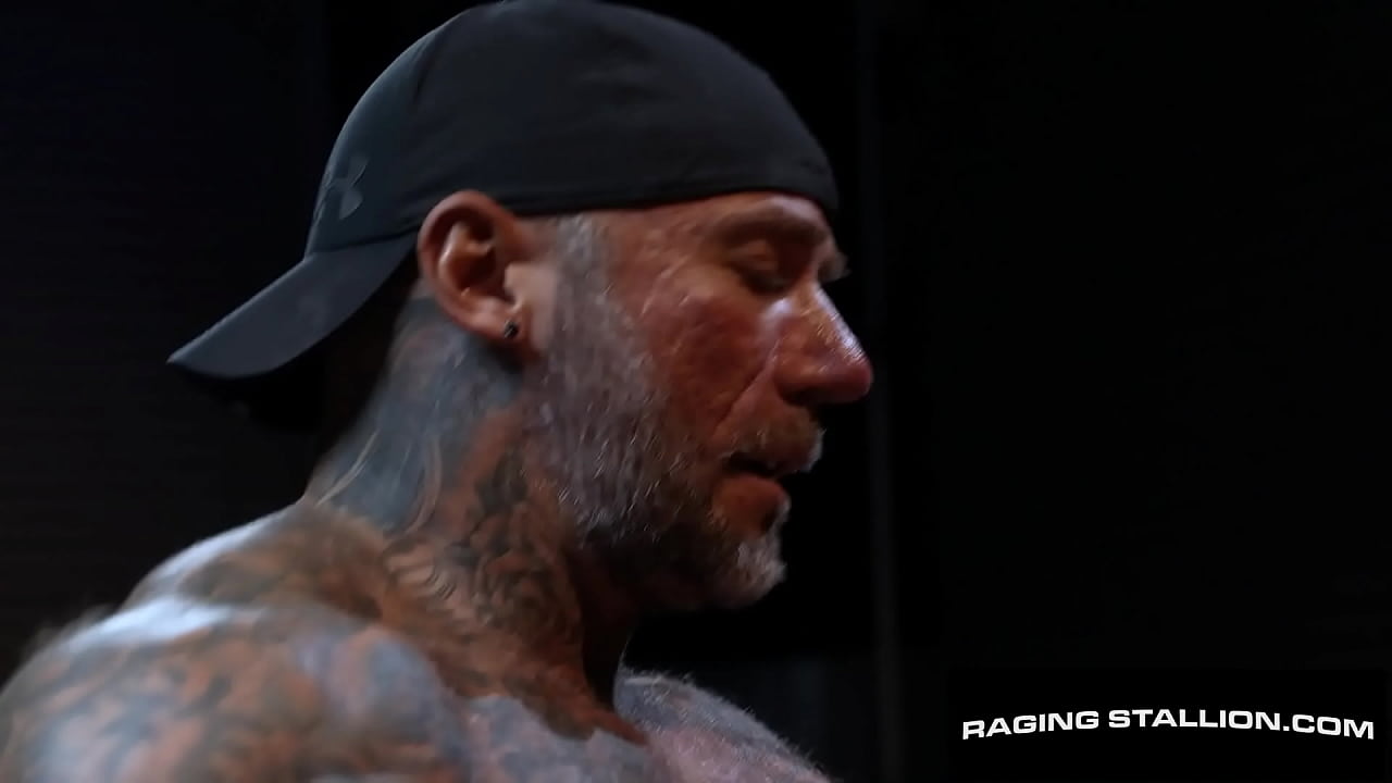 The girthy meat of Masculine Jason is filling up Bruce Jones' mouth as the inked-up muscle daddy looks down at his horny cocksucker.