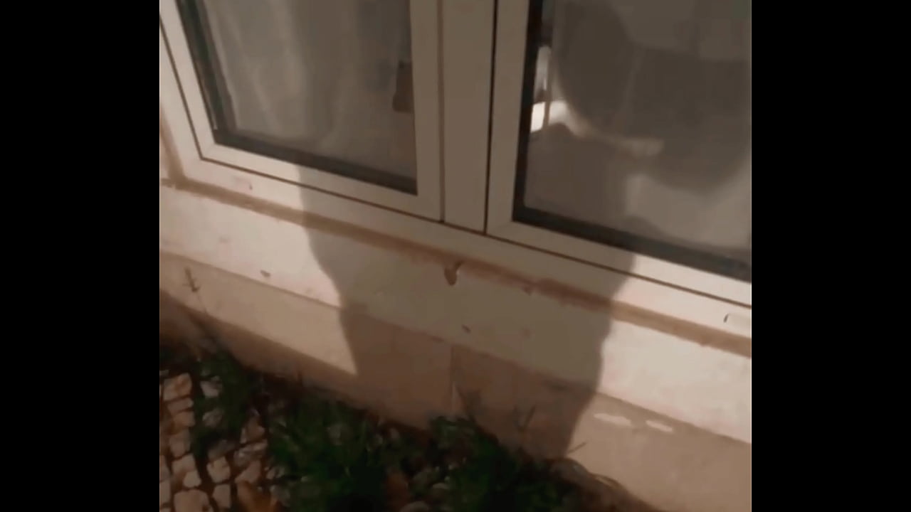 boy caught jerking-off on his bed through the street window