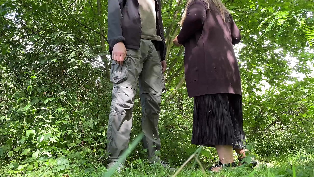 Fat MILF takes off her panties and bends over deeply to pee