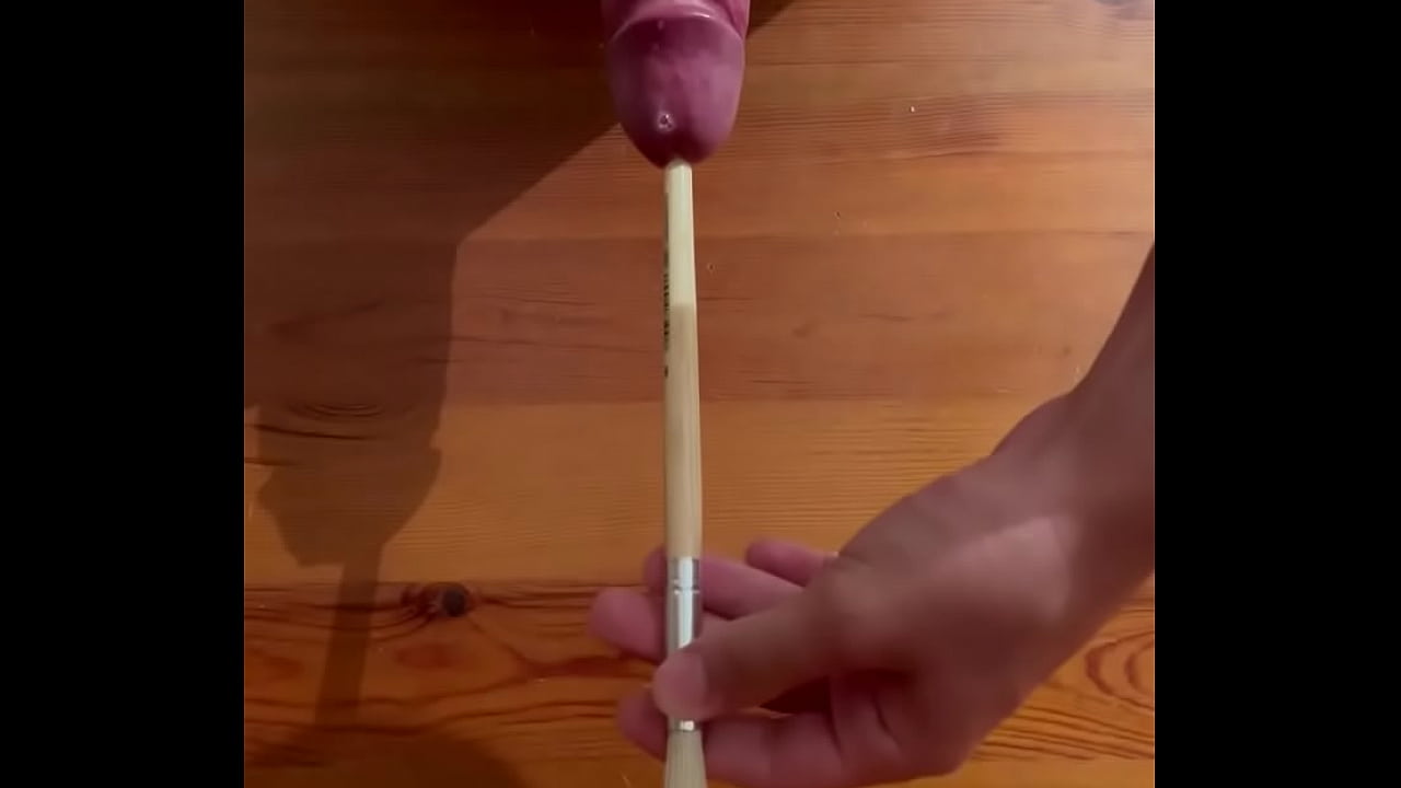 Cum sounding with wooden brush