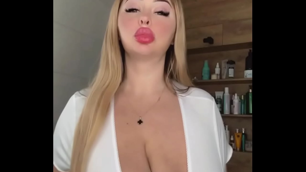 An adult MILF with natural tits is waiting, caressing