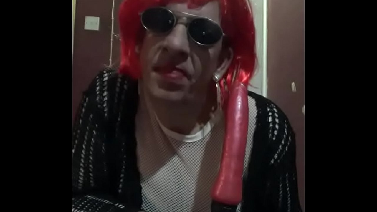 bisexual crossdresser sucks and fucks rubber cock