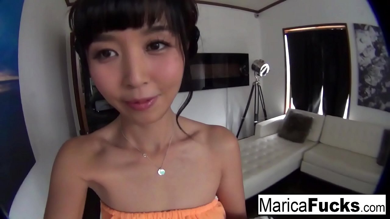 Hot Asian babe rubs her pussy