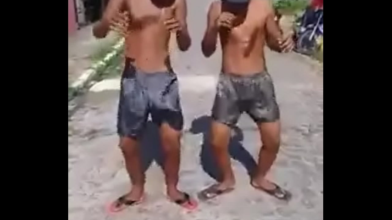 Teens Shaking Pau in the Street