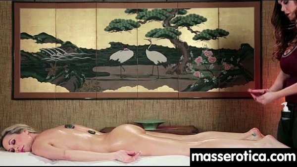 Massage therapist giving her patient some unknowing love 8