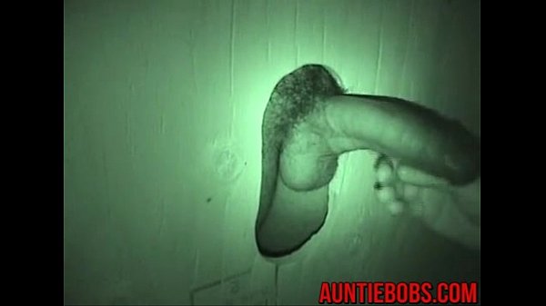 Big hairy dick swallowed through a wall