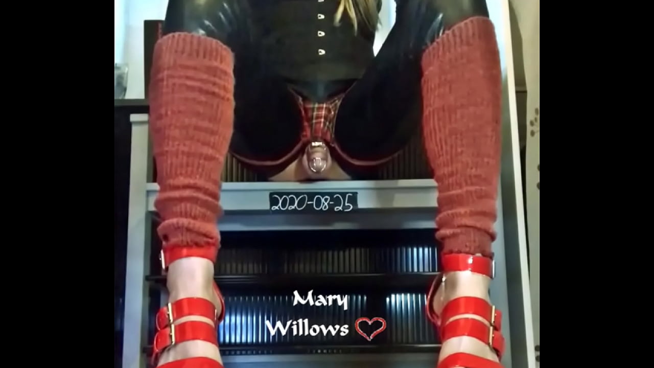 Mary Willows handsfree orgasm training while riding a massive dildo in tight steel chastity