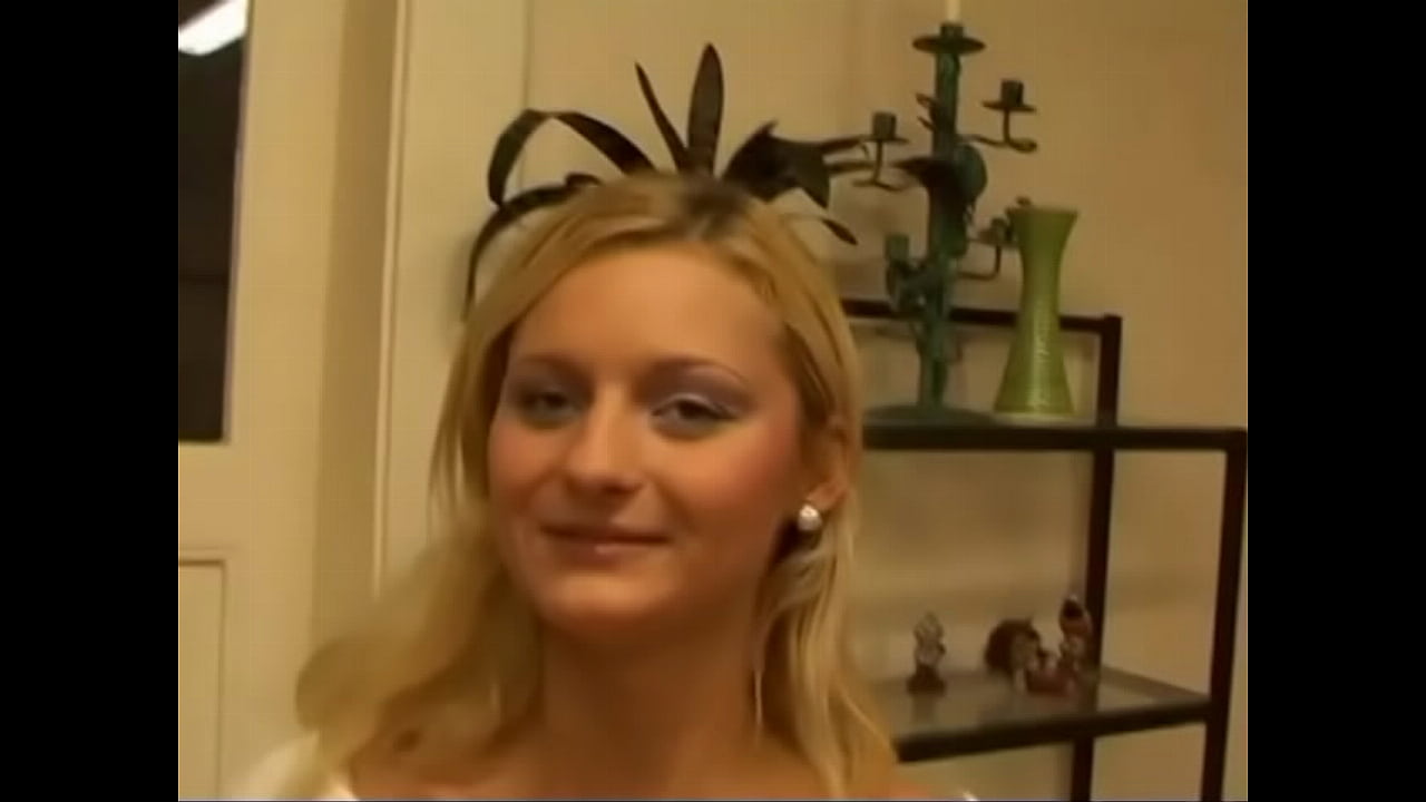 Blonde Jenny Tay gets on her knees and licks a throbbing shaft