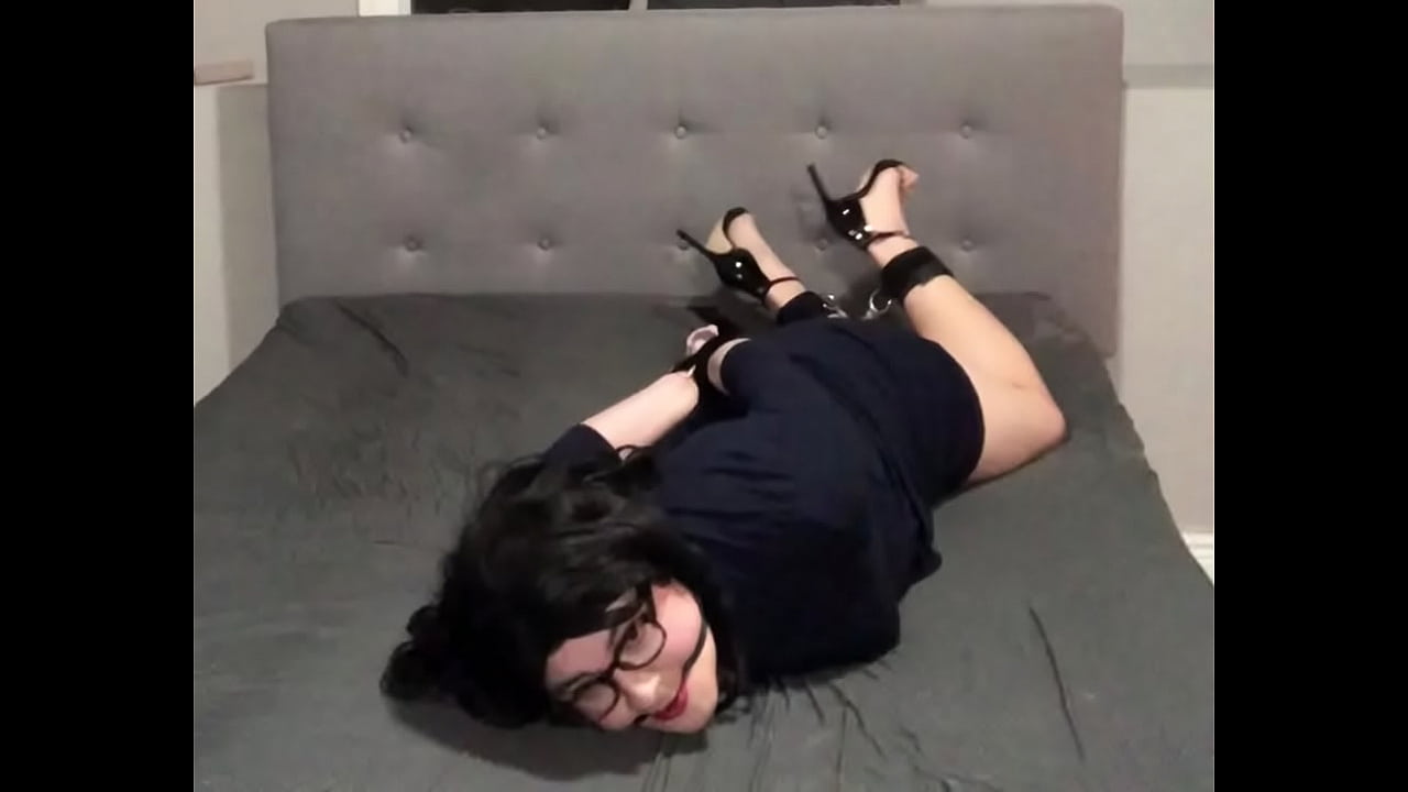 Cute crossdresser Lenise Villarreal is tied up and gagged and kept prisoner in the basement