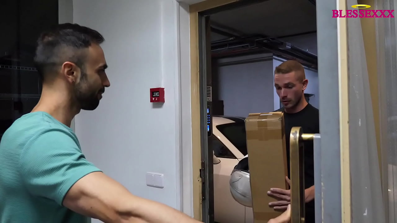 The delivery man gives me his package