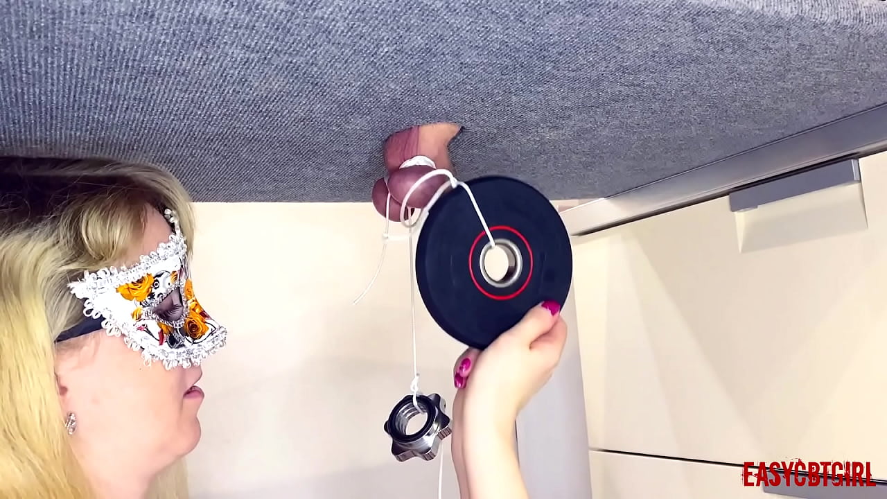 Slut tied my balls on the milking table and tugs at them