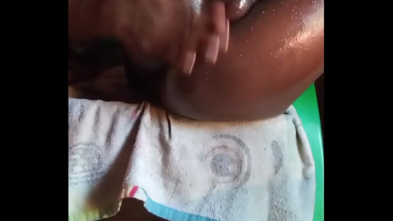 Cumming twice on my big black oiled ass