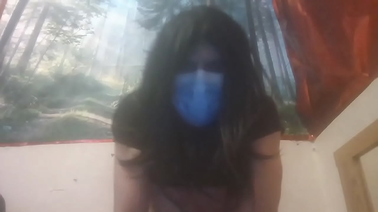 Tranny in mask rides black dildo