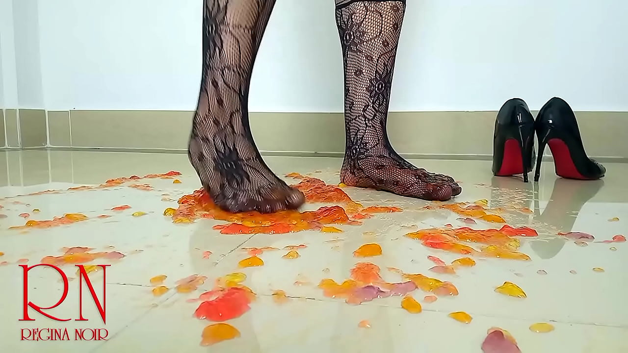 Sweet jeles destroying with high heels shoes on the floor. Full video