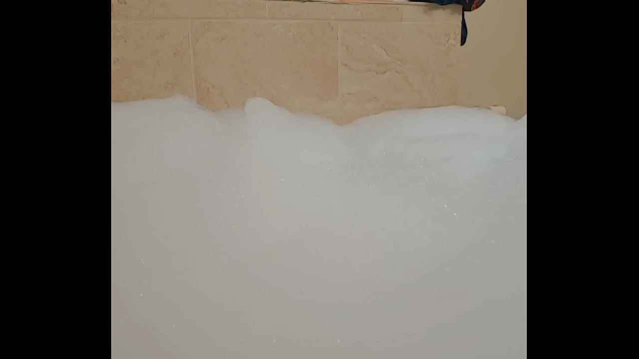 Dipping in a tub full of bath water and extreme soap