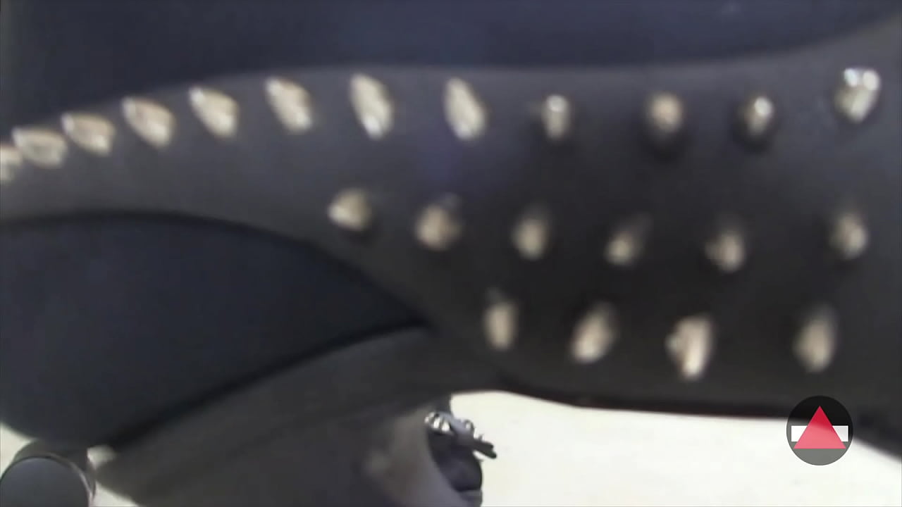 Pantyhose model takes off her shoes