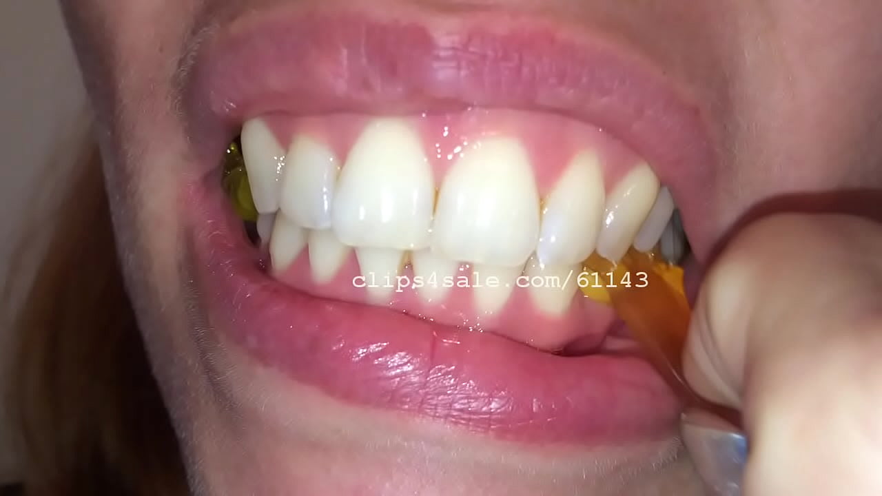 A Sexy Girl Chewing Candy