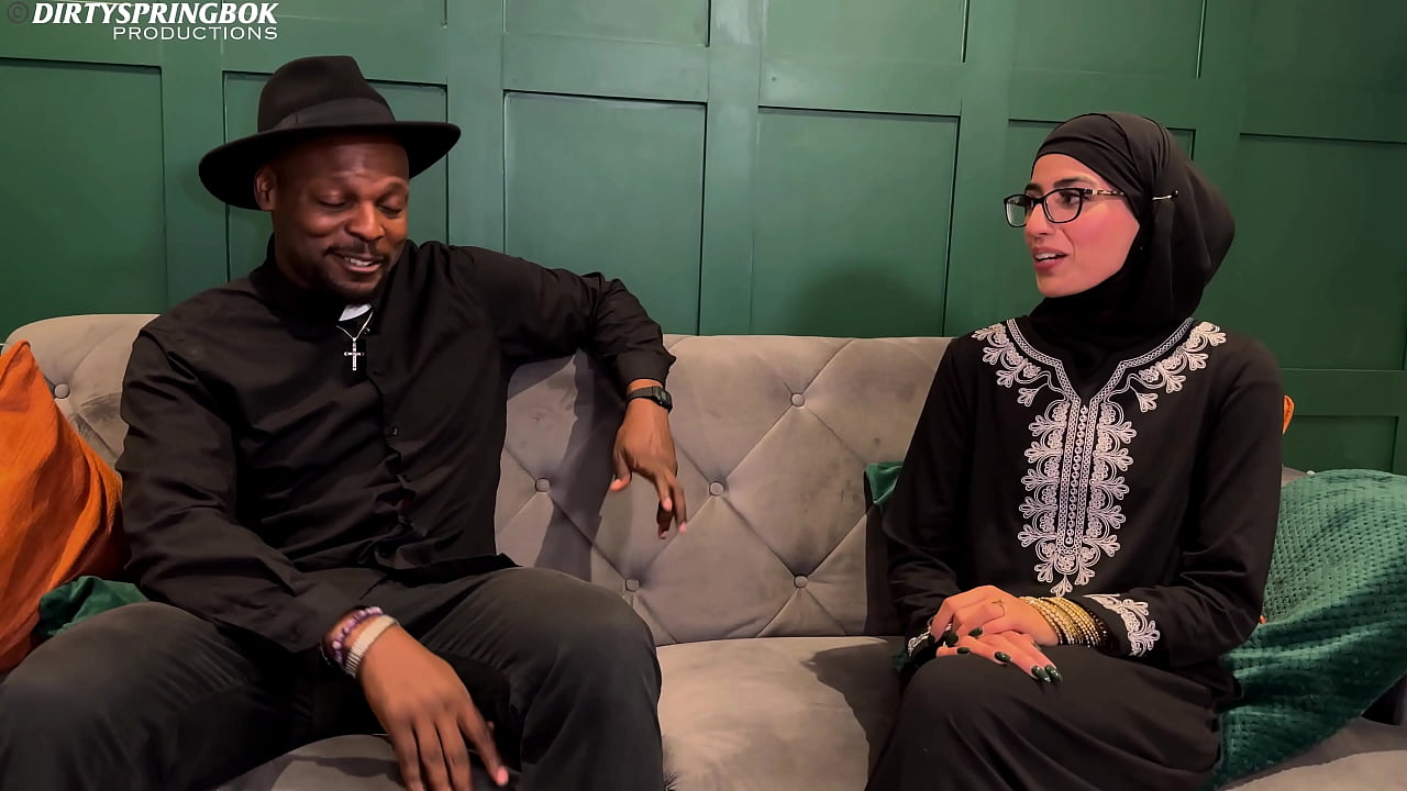 Muslim Aaliyah Yasin is blessed by Father Dimitri's holy water