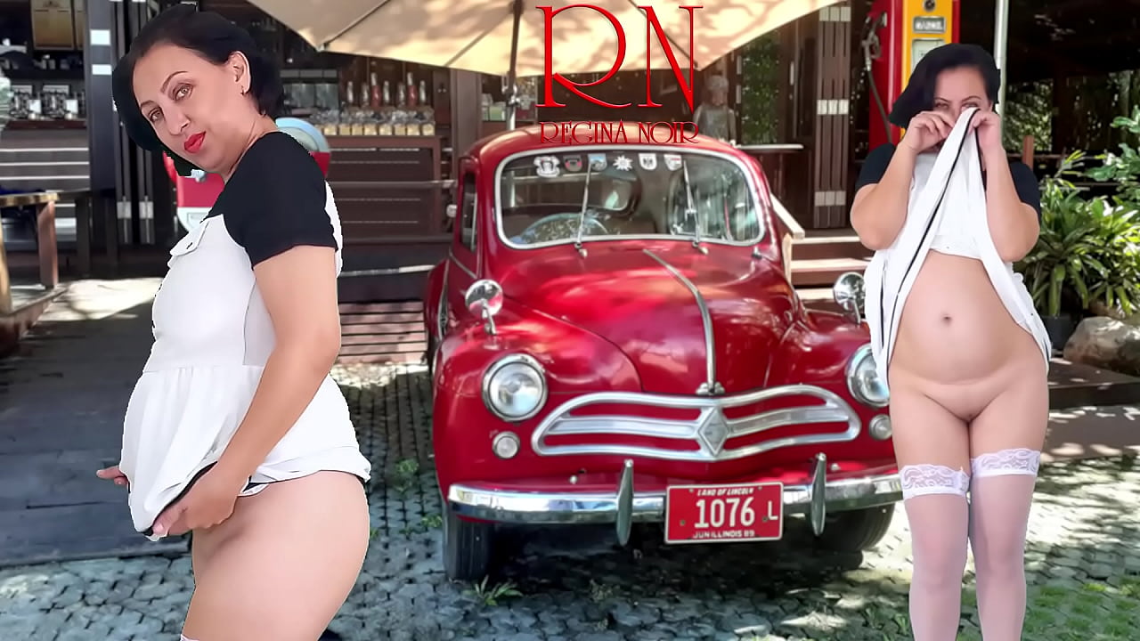 Double Regina Noir. A pretty lady in a short dress shows a striptease. Pussy and ass.