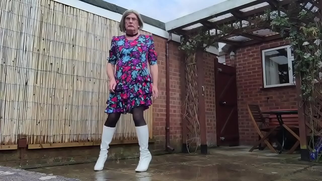 Crossdresser Exposed outdoors in white boots