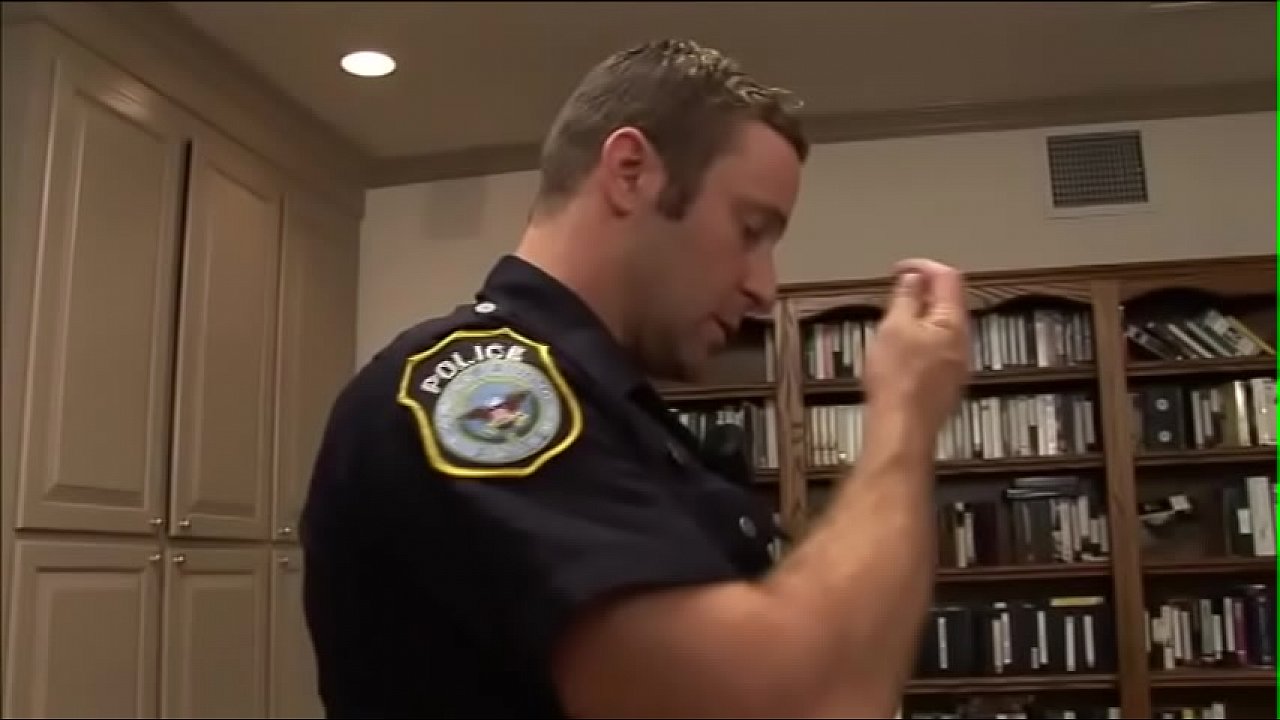 Slutty babe welcomes policeman and fucks him near the book shell