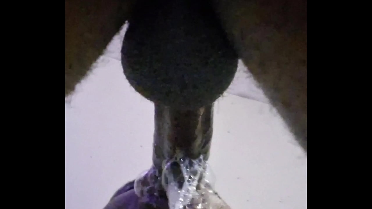 Blowing bubbles all over his dick