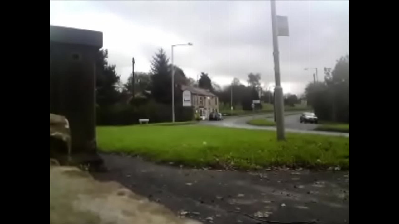 Waiting naked at a bus stop on busy road - public nudity