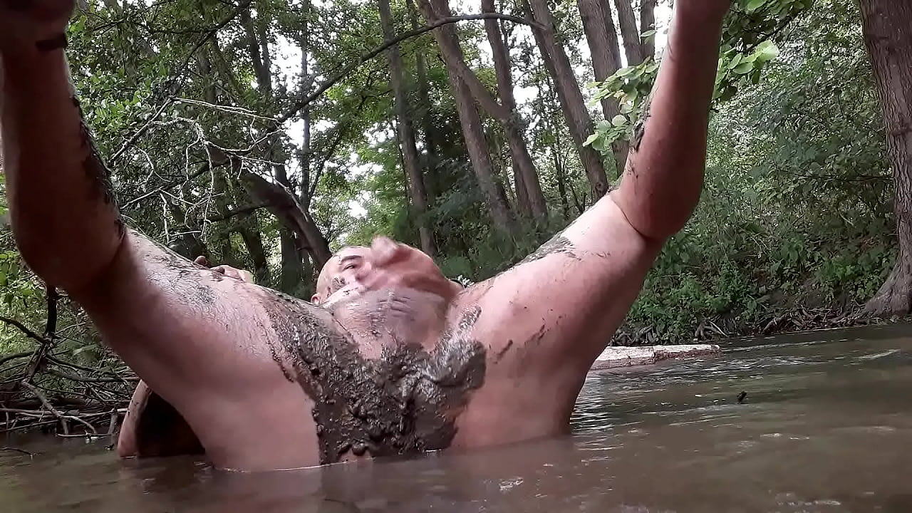 Fat pig in mud and water !