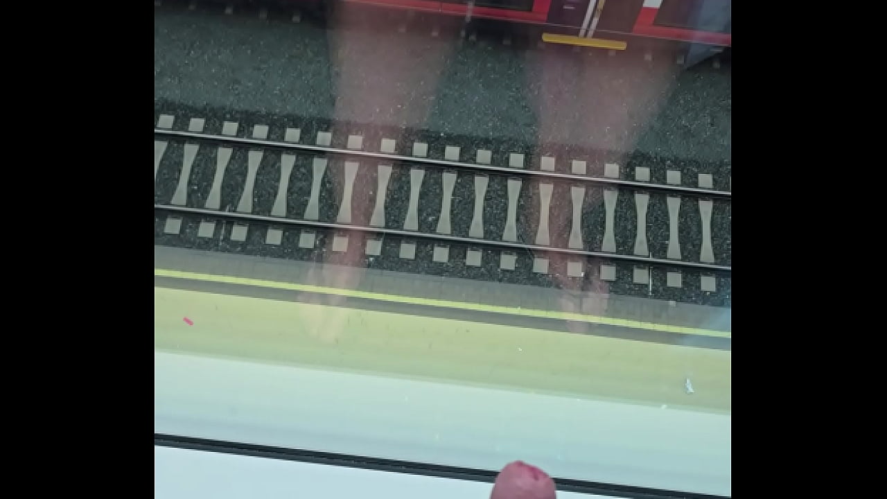 horny wank at the hotel window at the train station