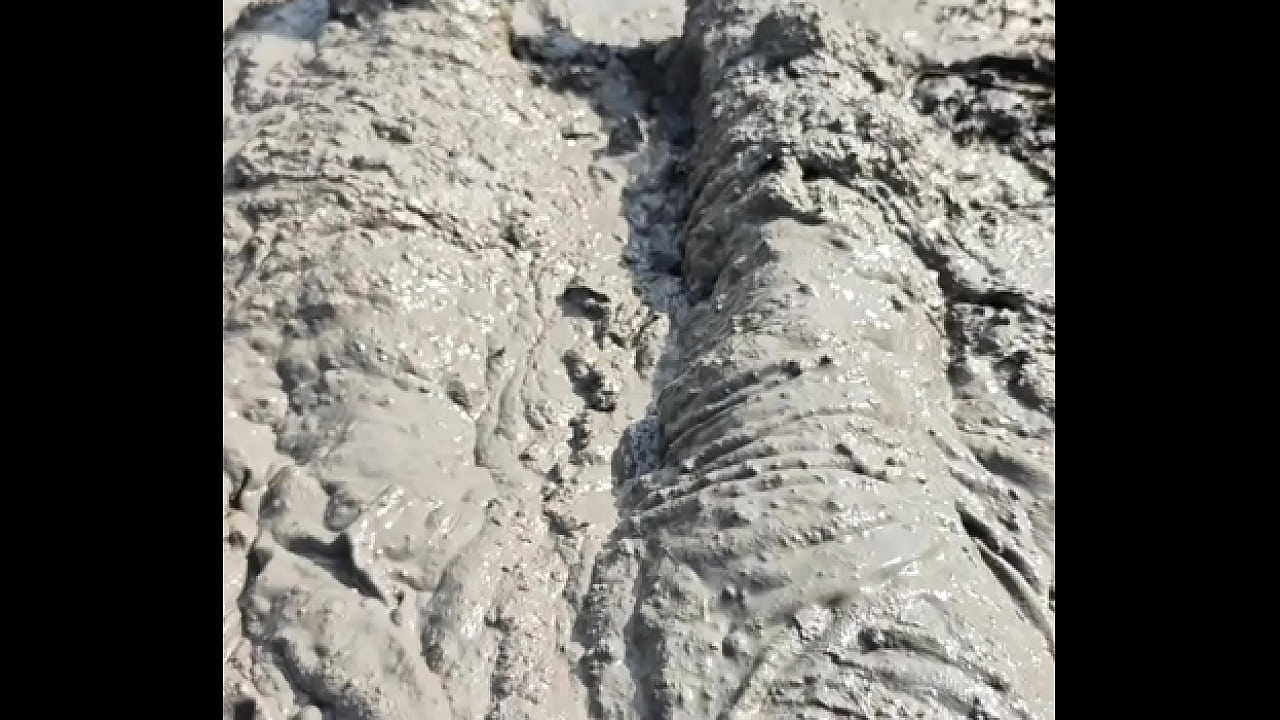 Barefooted Transversed into Muddy Lakebed at the Public Park 2