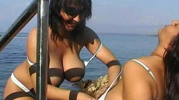 Busty Lesbian under water