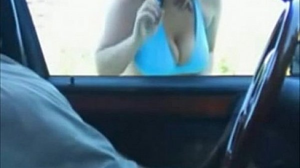 Busty Slut sucks cock threw car window!