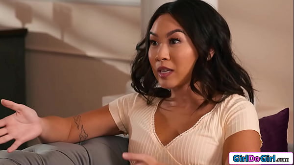 Asian stepdaughter Kimmy Kimm tells her busty stepmom Dee Williams she wants bigger tits.The milf tells her that her boobs are perfect and shows it  