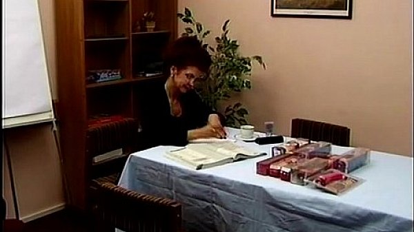 Mature lady demonstrating adult toys