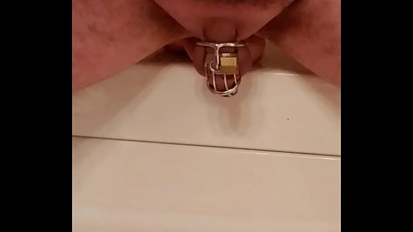 Man in Chastity fucks dildo hard