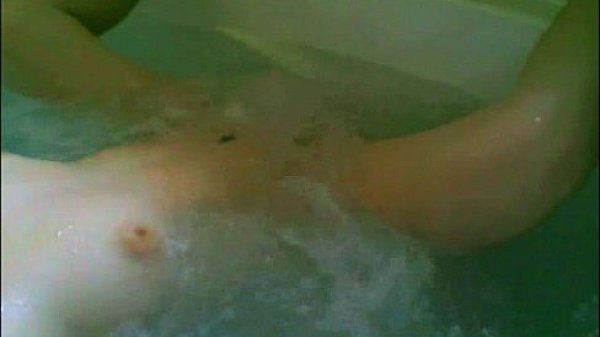 solo female in whirlpool bathtub