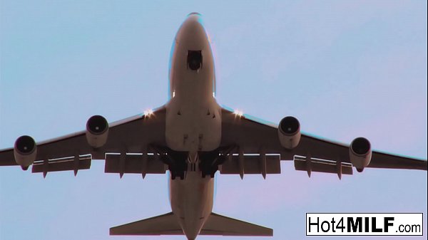 Hot MILF gets fucked on a plane