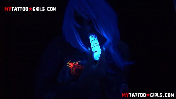 masturbating and showing glowing tattoos